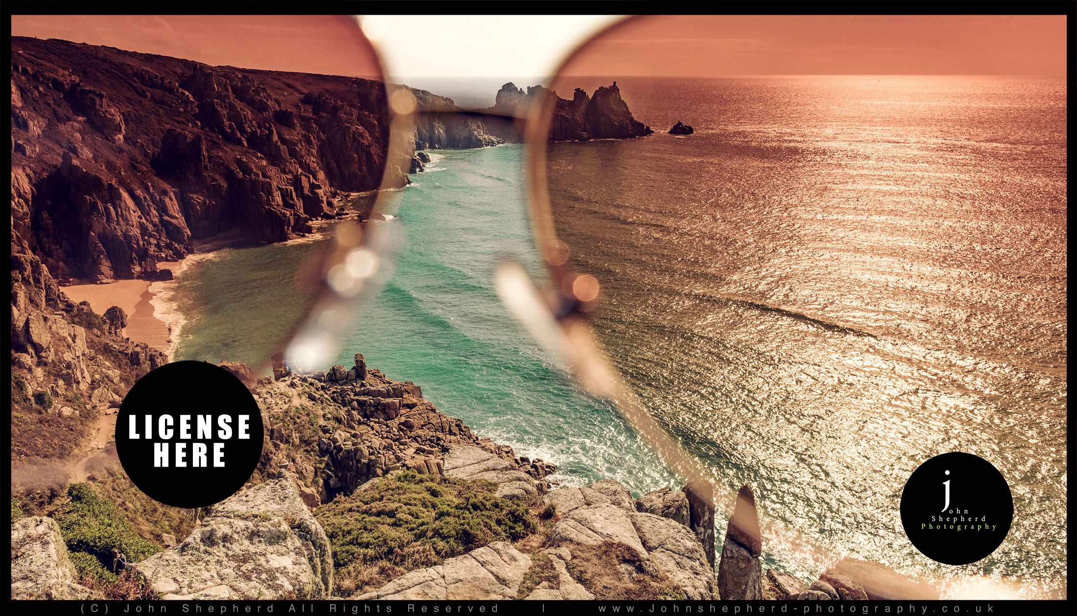 Scenic view through sunglasses of Pedn Vounder Beach.